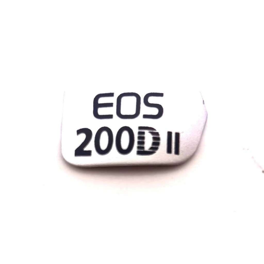 1PCS ใหม่สําหรับ Canon 200DII 200D รุ่นที่สอง ป้ายสีขาวสีดํา ป้ายป้าย ยี่ห้อ frout cover โลโก้อะไหล่ซ่อม