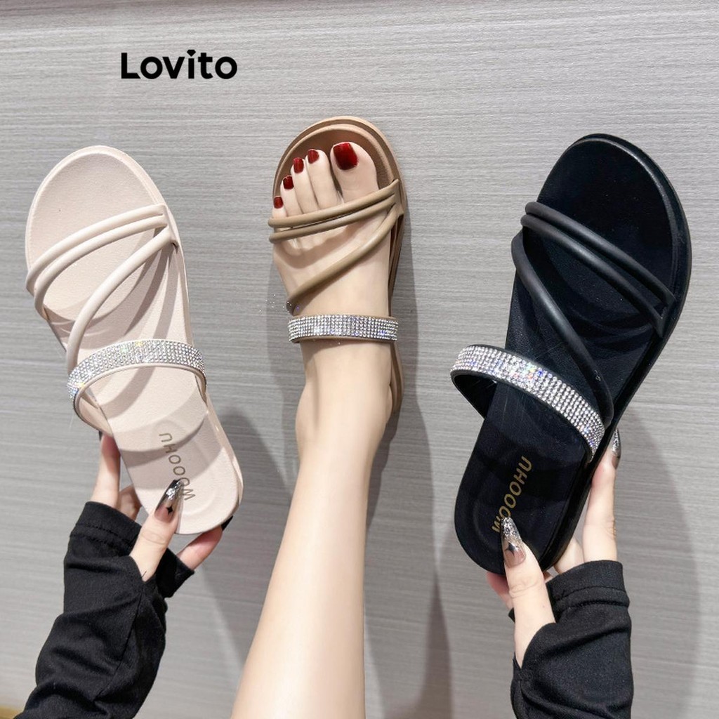 Lovito ลำลองสีพื้นFlash Diamond ไขว้อเนกประสงค์หนาป้องกันการลื่นด้านล่างนุ่มสวมใส่ด้านนอกรองเท้าแตะแบนสําหรับผู้หญิง  LFA67222