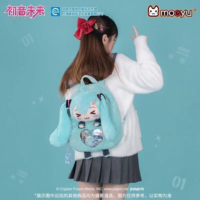 Fast Shipping Influencer สไตล์เดียวกัน Hatsune miku กระเป๋าเป้สะพายหลังสไตล์ใหม่ Squinting Hatsune miku กระเป๋า Hatsune miku ปวดกระเป๋าสองมิติกระเป๋า miku ปวดสาวกระเป๋าเป้สะพายหลังของขวัญวันเกิด