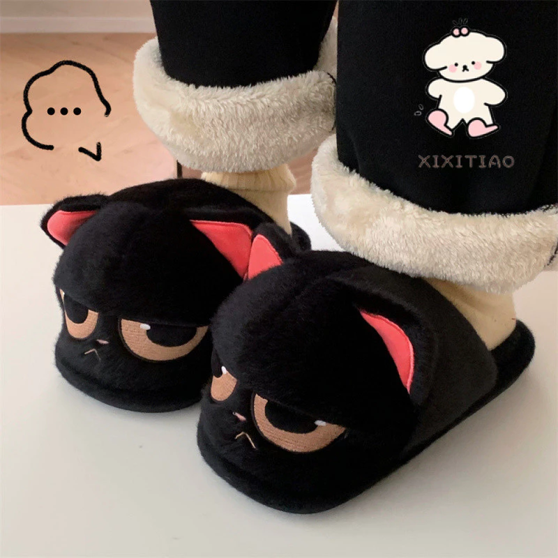 ฉี่เตียว ฤดูหนาวการ์ตูนน่ารักคู่โกรธแมวสีดําเล็กๆน้อยๆแฟชั่นผู้ชายผู้หญิงรองเท้าผ้าฝ้ายที่อบอุ่น