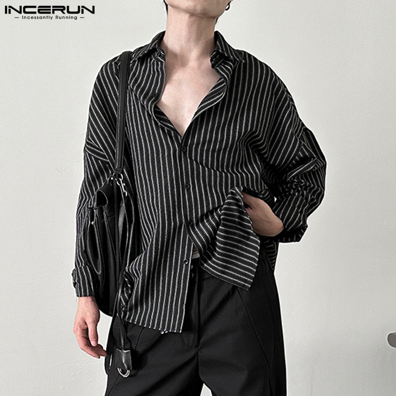 ไม่แน่นอน เสื้อเชิ้ตแขนยาวทรงหลวมลายทางสําหรับผู้ชาย