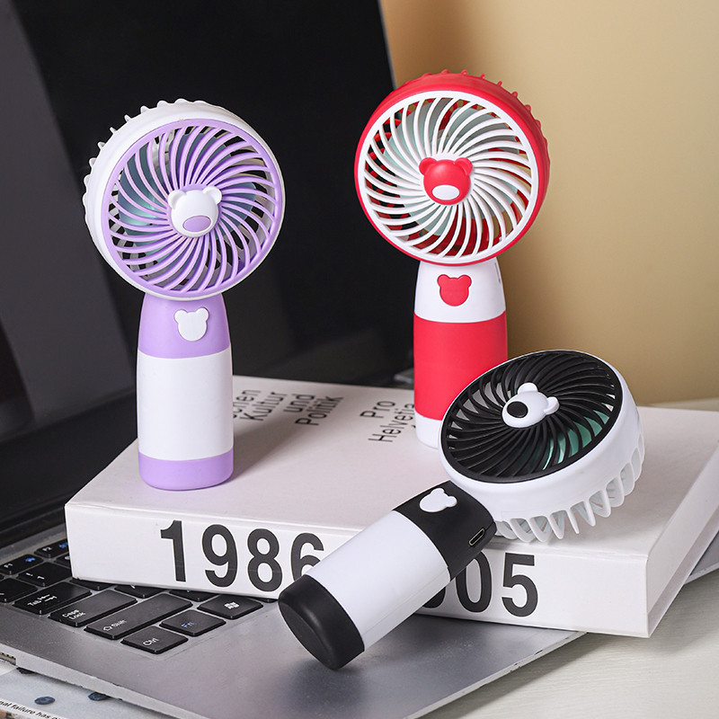 EYEพัดลมตั้งโต๊ะ แบบพกพาใหม่มินิมือถือพัดลมขนาดเล็กน่ารักและสดUSBชาร์จมือถือพัดลม แฟชั่นสีชน ลายหมีน้อย ปรับแรงลมได้3ระด