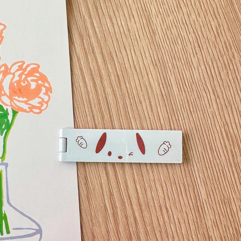 ขาตั้งโทรศัพท์มือถือญี่ปุ่นแบบพกพาที่มองไม่เห็นกรอบแบนขาตั้งโลหะพับได้การ์ตูนน่ารักเดสก์ท็อปสนับสนุน - รูปที่ 5