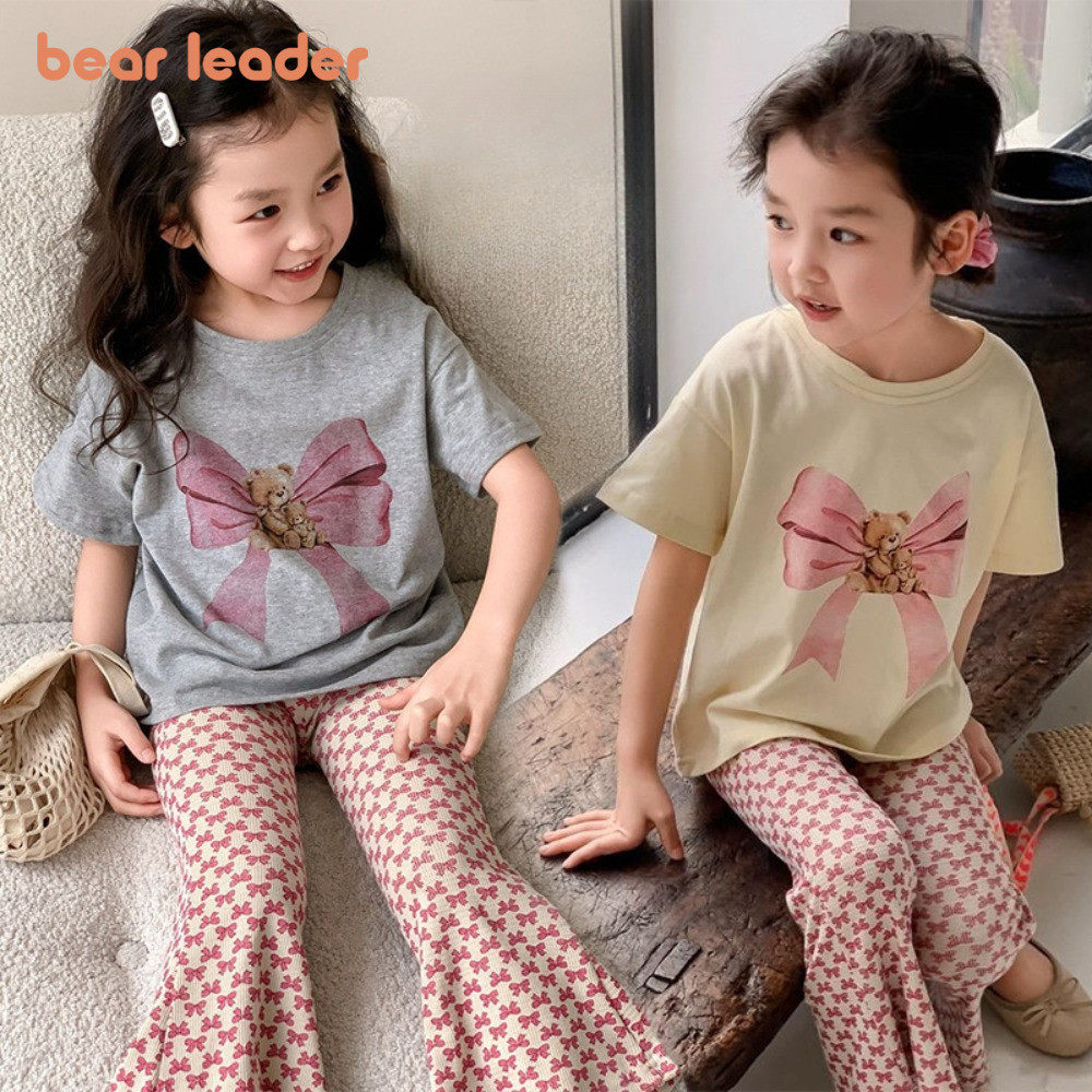 หมีผู้นําลําลองสาวเสื้อผ้าชุดแขนสั้นหมีโบว์พิมพ์เสื้อยืด + กางเกงระฆังชุดสองชิ้นชุดลําลองฤดูร้อน