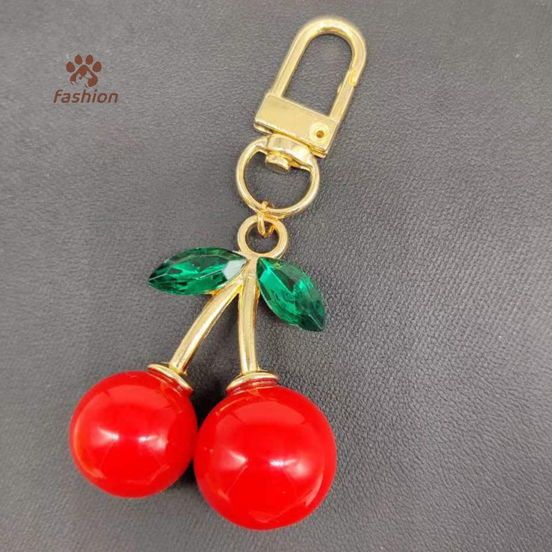 [แฟชั่น] อินเทรนด์โลหะผสม Cherry Charm อุปกรณ์เสริมกระเป๋าสตรีรถพวงกุญแจจี้ Cherry Adornment กระเป๋าส่วนบุคคลตกแต่งสําหรับผู้หญิง {TH}