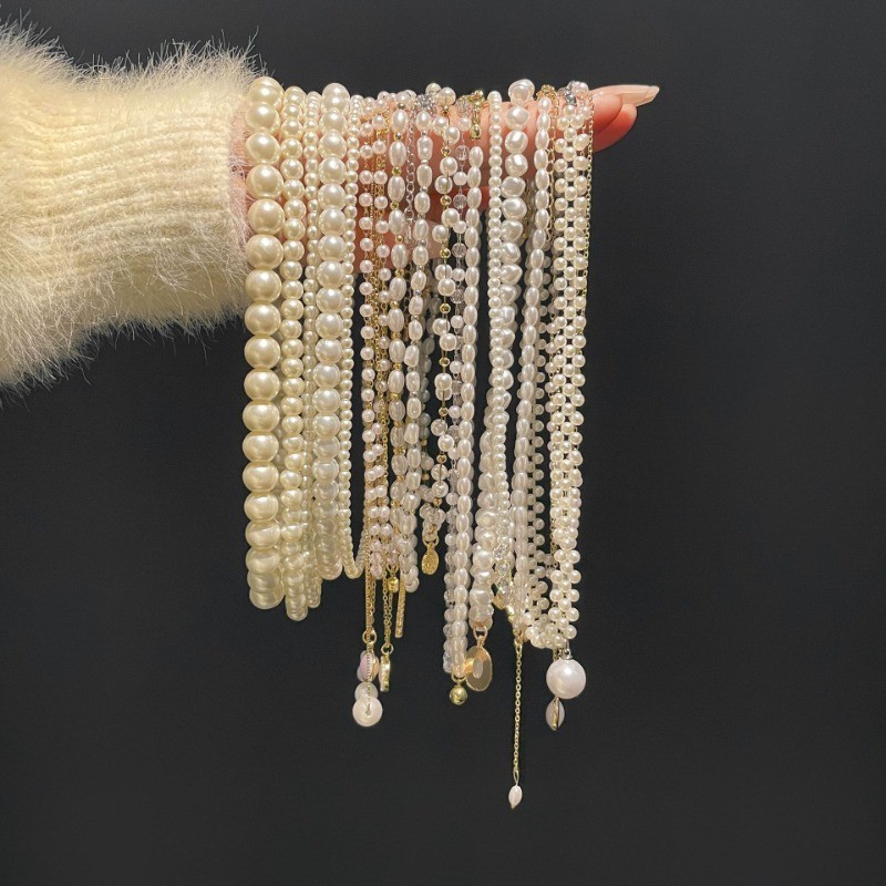แฟชั ่ นสร ้ อยคอมุกจี ้ ผีเสื ้ อ High-end Love Clavicle Chain เครื ่ องประดับโลหะผสม