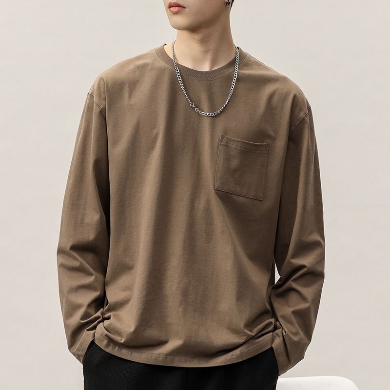 เสื้อยืดแขนยาวผู้ชายแฟชั่นหลวมเรียบง่ายแบรนด์กระเป๋าหน้าอกแบบสบายๆ ใส่ได้ทุกโอกาสฤดูใบไม้ผลิและฤดูใบไม้ร่วง