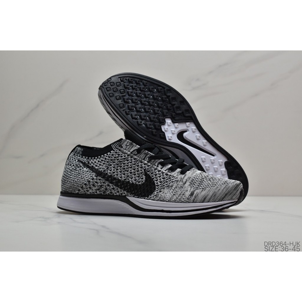สิทธิพิเศษ Nike Flyknit Racer รองเท้าวิ่งที่สะดวกสบายดูดซับแรงกระแทก รองเท้าผ้าใบระบายอากาศ
