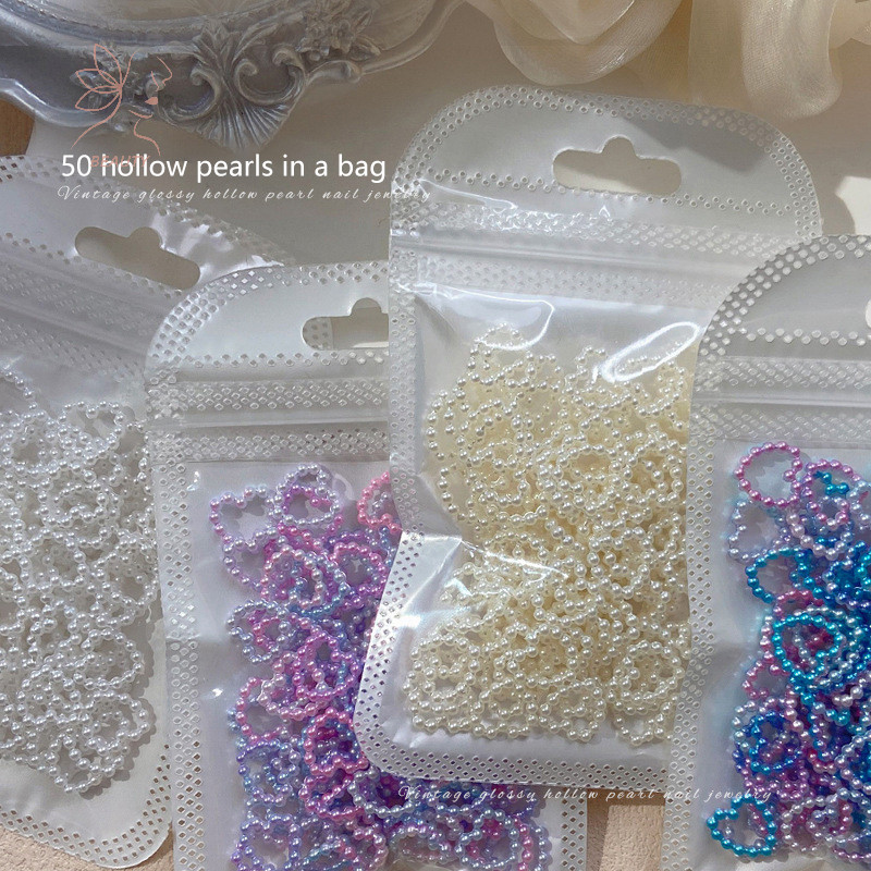 [maybeauty] 50 ชิ้นสีขาวสีม่วงสีชมพูหัวใจมุกตกแต่งเล็บ Hollow Ch จํานวนมาก 3D อุปกรณ์ตกแต่งเล็บสําหรับผู้หญิงสาวเล็บ {TH}