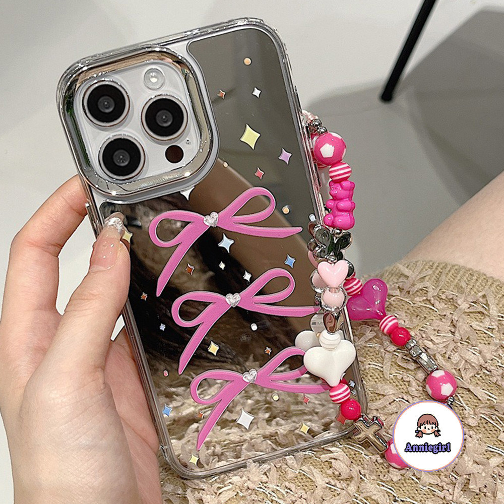 เคสโทรศัพท์มือถือ กันกระแทก ปิดด้านหลัง ประดับโบว์ สีชมพู พร้อมสายคล้องข้อมือ และกระจก สไตล์เกาหลี สําหรับ IPhone 11 15 14 Pro Max 12 13Promax XS XR 7 8Plus