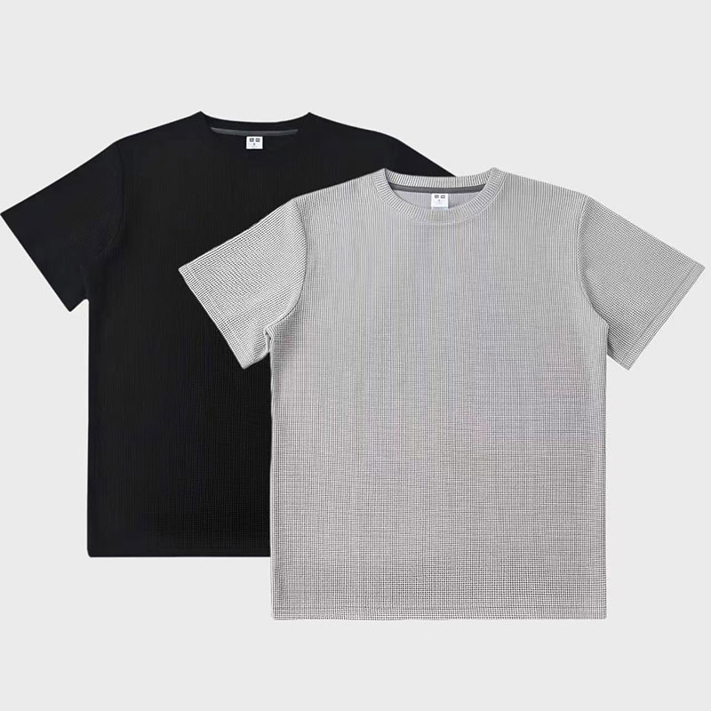 ฤดูร้อนชายเสื้อยืดแขนสั้นหลวมพอดีกับสไตล์เกาหลีสีทึบชายและหญิง