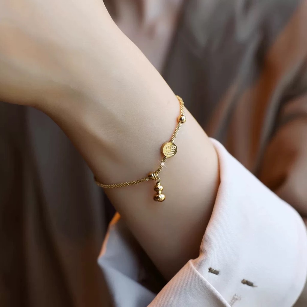 ใหม่สไตล์จีน Fuzi Gourd Gold สร้อยข้อมือเหล็กไทเทเนียม Niche Retro หรูหรา High-End สร้อยข้อมือ