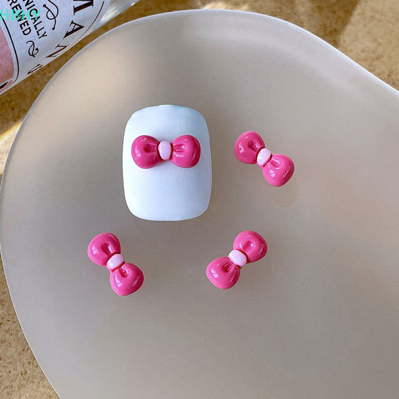 HB 10 ชิ้น Kawaii สีดํา Hello Kitty ตุ๊กตาเล็บอุปกรณ์เสริมอะนิเมะ Sanrios Y2k เรซิ่น KT แมวโบว์เล็บความงามตกแต่งเล็บ HY