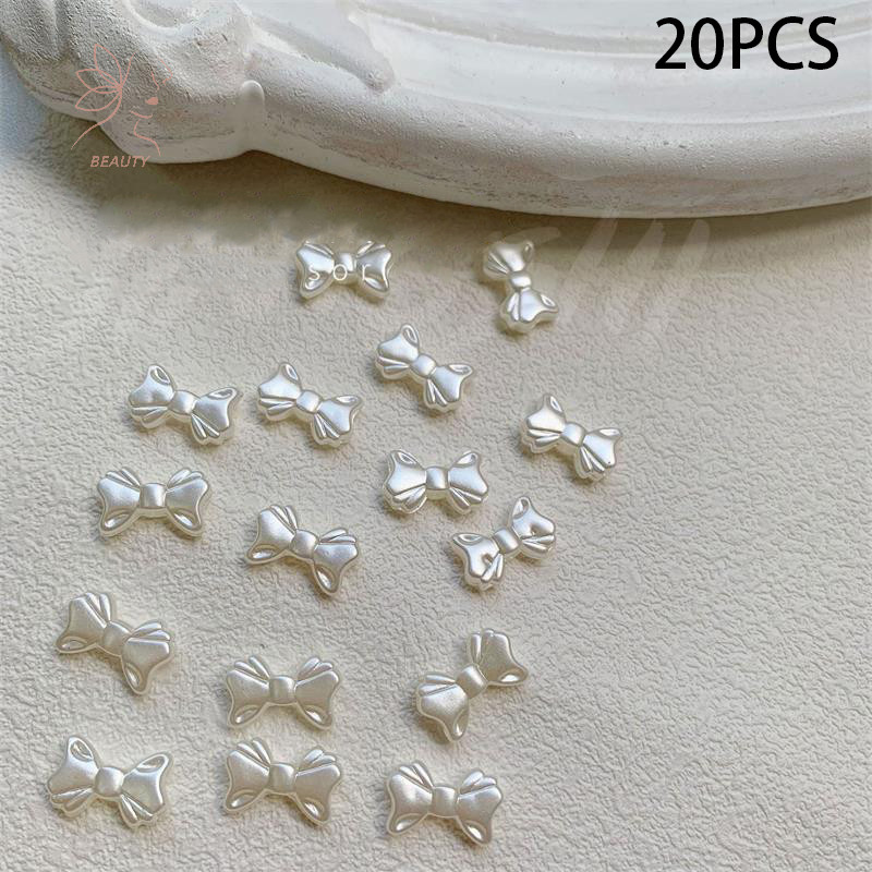 [maybeauty] 20 ชิ้น/ถุงสีขาวมุก Retro French Simple Bowknot Nail Art Accessories Elegant Gentle Bowknot 3D เรซิ่น DIY Nail Art Accessories {TH}