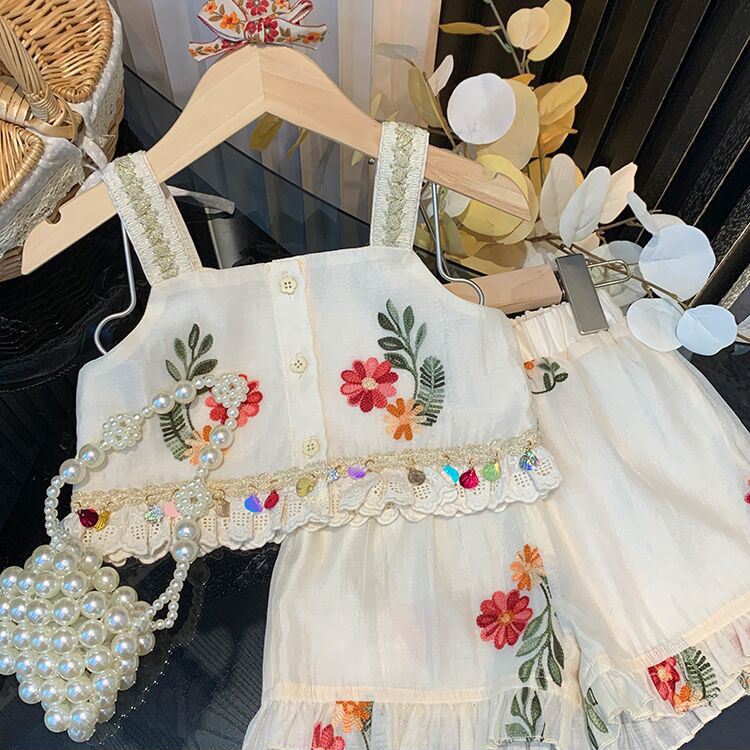 ใหม ่ สาวน ้ อยแฟชั ่ นกางเกงขาสั ้ นชุดสองชิ ้ นฤดูร ้ อนเด ็ กสาวแฟชั ่ นผู ้ มีอิทธิพลปักชุดสลิง