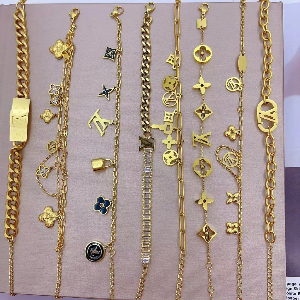 20 สแตนเลสที ่ ทันสมัยและสง ่ างาม L-family lucky grass double-layer chain สร ้ อยข ้ อมืออุปกรณ ์ เสริมสําหรับผู ้ หญิง