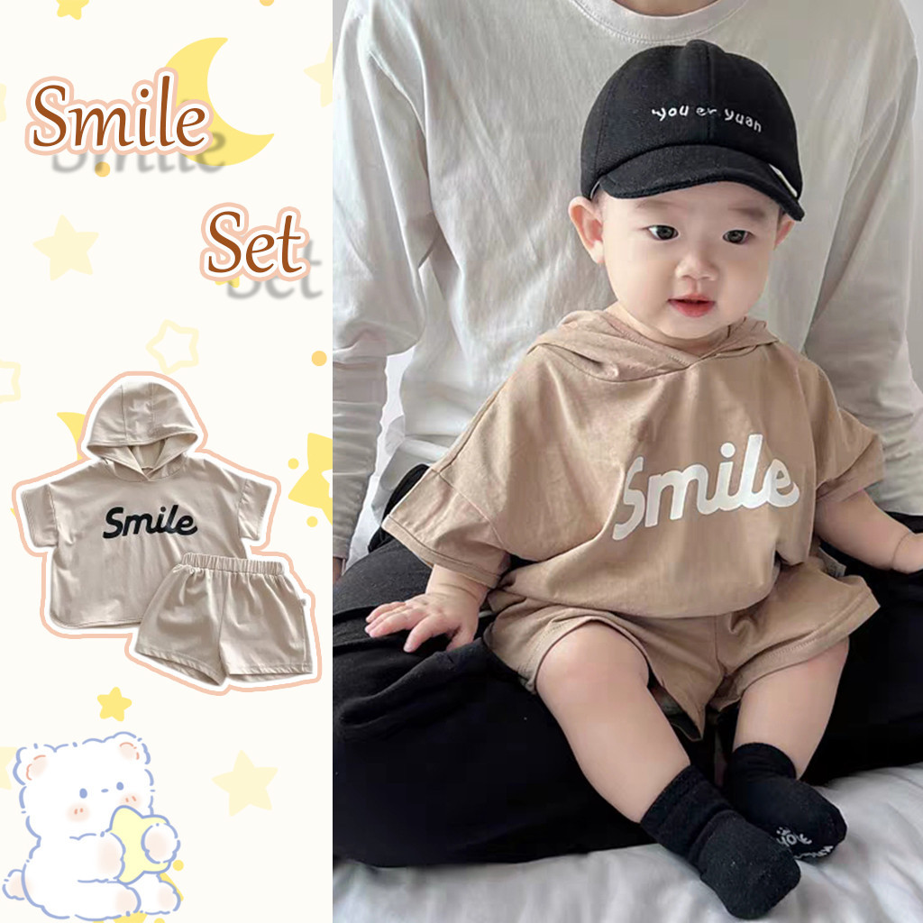 อิน ฤดูร้อนเด็กเวอร์ชั่นเกาหลีของสองสีรูปแบบตัวอักษรแขนสั้นคลุมด้วยผ้าด้านบน + กางเกงขาสั้นขาวดํา2ชิ้นชุดเด็กเสื้อผ้าเด็กยิ้มชุดเด็ก1-5ปี