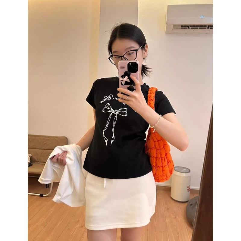 เสื้อยืดผู้หญิง เสื้อยืดสวยๆผู้หญิง เสื้อพิมพ์ลาย เสื้อยืดแขนสั้นพิมพ์ลายตัวอักษรโบว์ยอดนิยมแบบใหม่ ราคา ถูกที่สุด ดีลบีเคเค แกลเลอรีภาพที่ 9