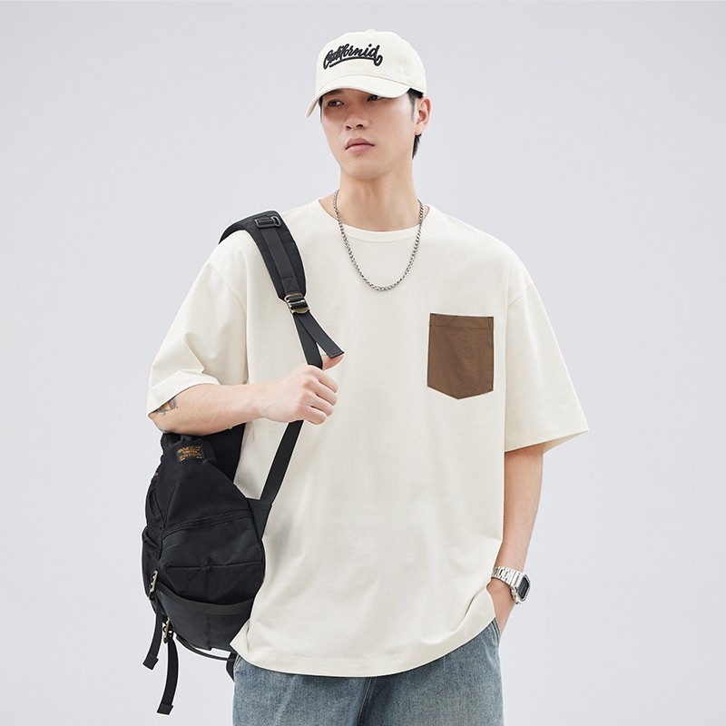 ⚡️ProMan⚡️ฤดูร้อนสีตัดกันกระเป๋าแขนสั้น  เสื้อคอกลม  เรียบง่าย  แบบหลวม