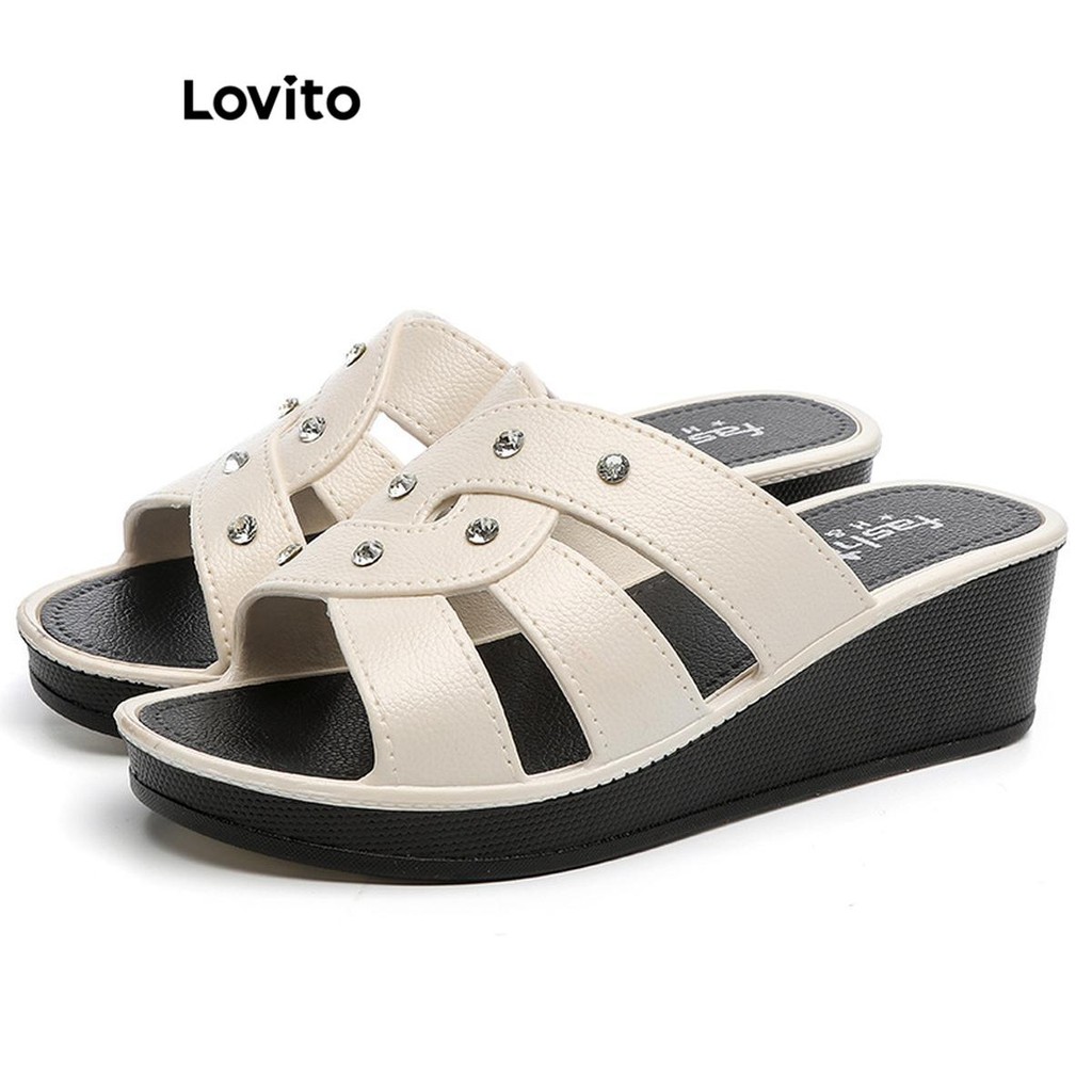 Lovito รองเท้าแตะส้นแบน ไขว้ธรรมดาลําลองสําหรับผู้หญิง LFA66212