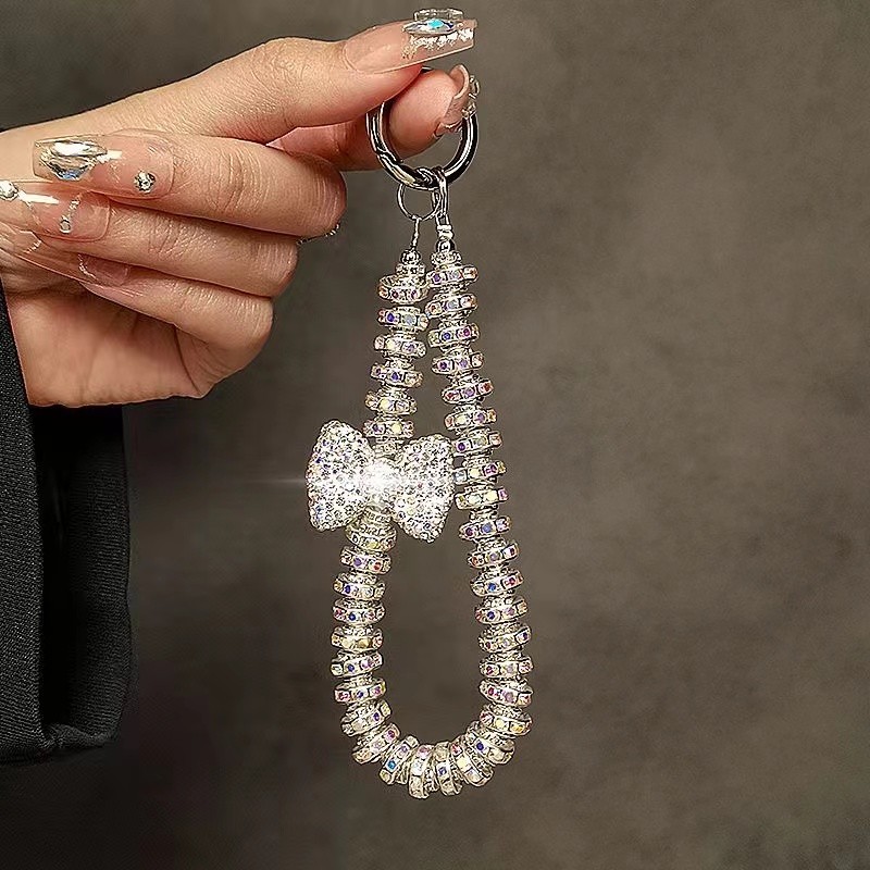 หรูหราเพชร-โบว์โบว์มือโซ่ข้อมือเชือกเส้นเล็กสั้นกับคลิปกรณีโทรศัพท์มือถือพวงกุญแจจี้การสูญเสียกันกระแทกจี้