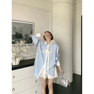 ฤดูใบไม้ผลิใหม่สบายๆที่เรียบง่ายอ่อนโยนเสื้อเชิ้ตลายทางสีฟ้าผู้หญิง 250326