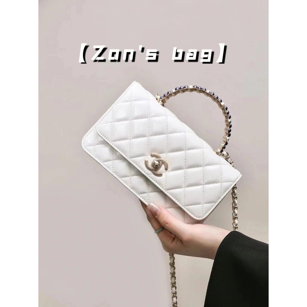 [เกรด Daigou] ซองเล็ก [Chanel 24P Pearl Handle woc/กระเป๋าออร์แกน] สีขาว