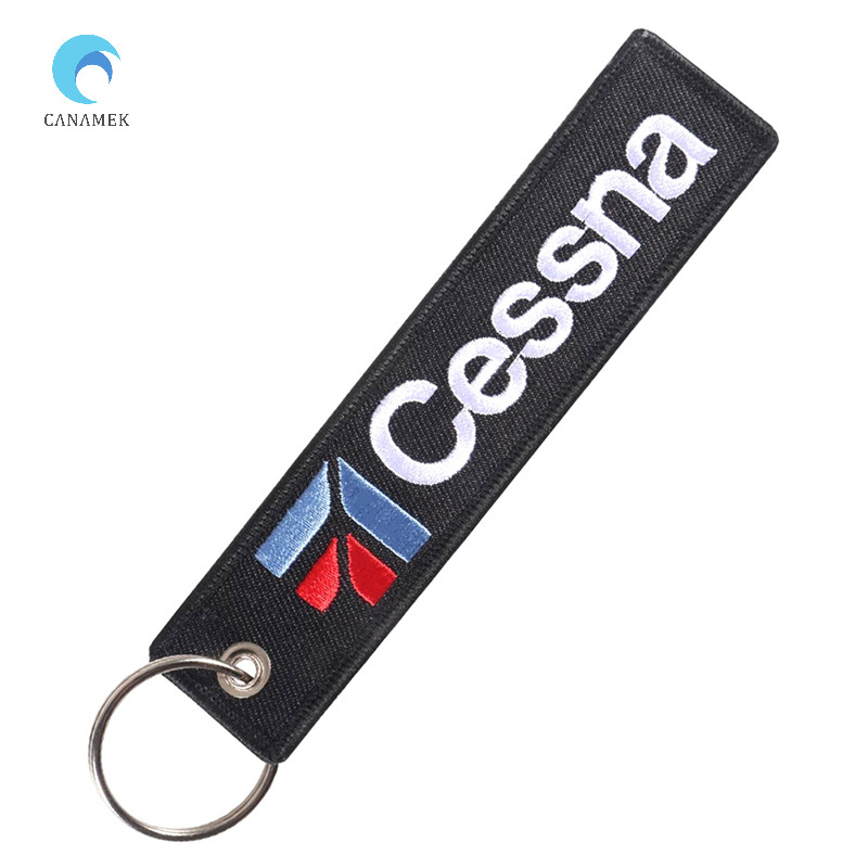 Canamek 1PC Cessna ตัวอักษรทั ้ งเย ็ บปักถักร ้ อยรูปแบบพวงกุญแจรถจักรยานยนต ์ Key แหวนเครื ่ องประดับของขวัญอุปกรณ ์ เสริมใหม ่