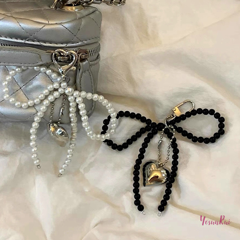 YosunRui] Ins สไตล์ Bowknot ลูกปัดสามมิติเงินหัวใจโทรศัพท์จี้หูฟังกรณี Charm กระเป๋าตกแต่งพวงกุญแจรถใหม่