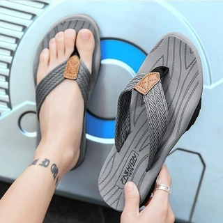 [ส่งจากไทย] รองเท้าแตะผู้ชาย Flip-Flops คุณภาพสูงอินเทรนด์เย็บสองสีเชือกผูกรองเท้า Double-Layer Sole ทนต่อการสึกหรอรองเท้าแตะกันลื่นกีฬาเดินป่า Shock（39-46 หลา）