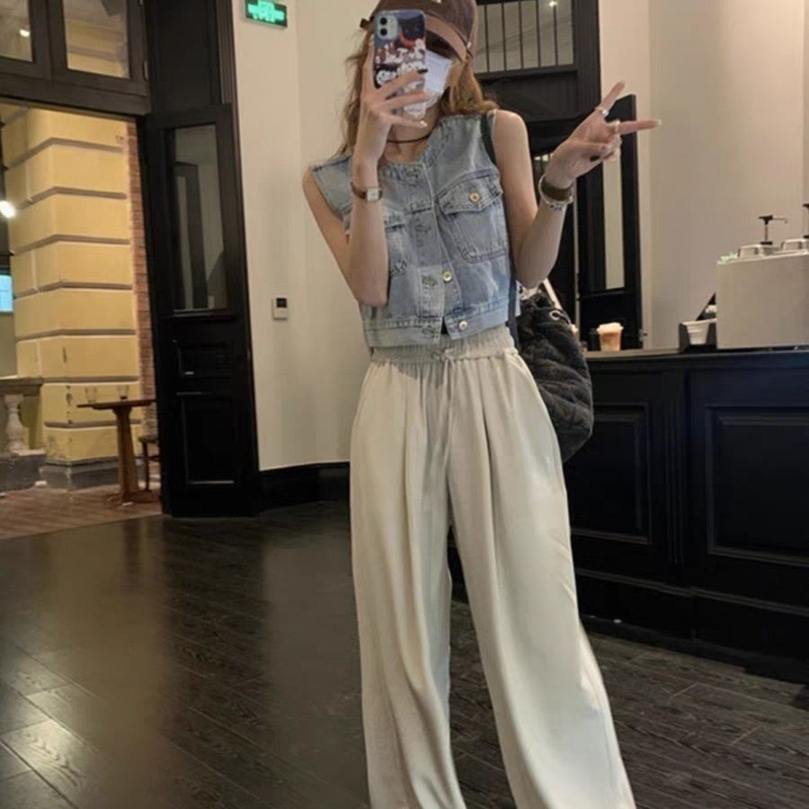 Retro เสื้อกั๊กยีนส์สั้นเสื้อกั๊กแจ็คเก็ตผู้หญิงฤดูร้อน Simple All-Match สไตล์ใหม่ด้านนอกหลวมเสื้อกั๊กแขนกุดอินเทรนด์ - รูปที่ 2