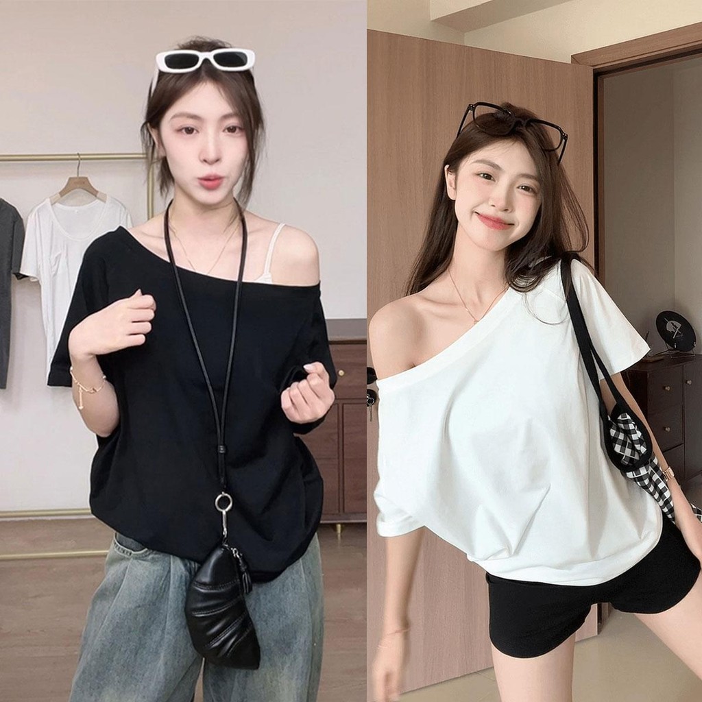 Dahong 💖 เสื้อยืดผู้หญิง สไตล์เกาหลีสีทึบปิดไหล่เสื้อยืดผู้หญิงฤดูร้อนหลวมหนึ่งไหล่สไตล์อเมริกันเผ็ดสาวด้านบน S-XL 2687
