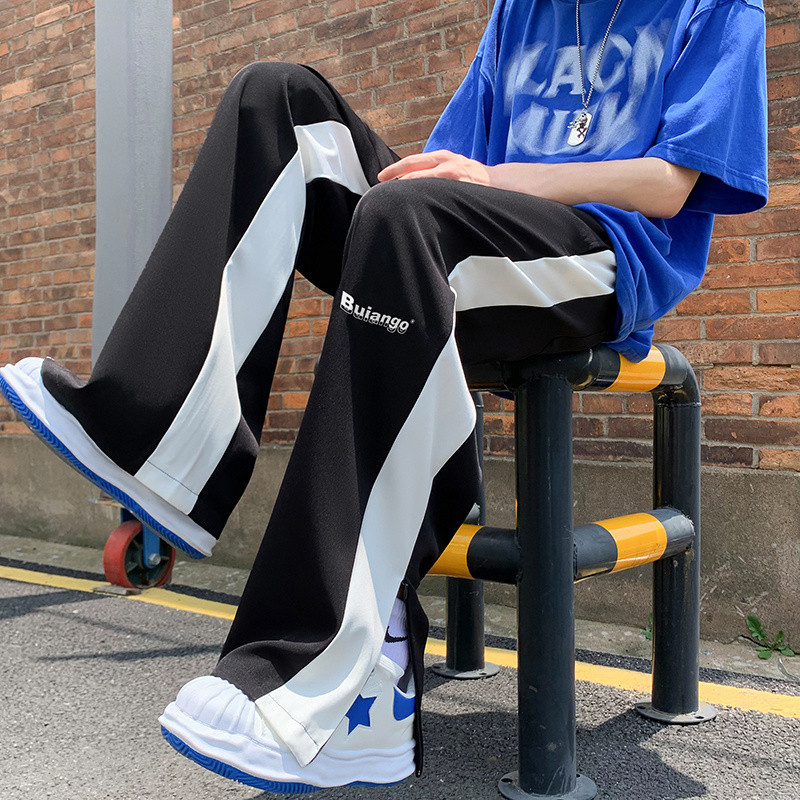 Street Wear Sweatpants ผู้ชายฤดูร้อน Street Wear Side Stripes Slit Sweatpants กางเกงลําลองขนาดใหญ่