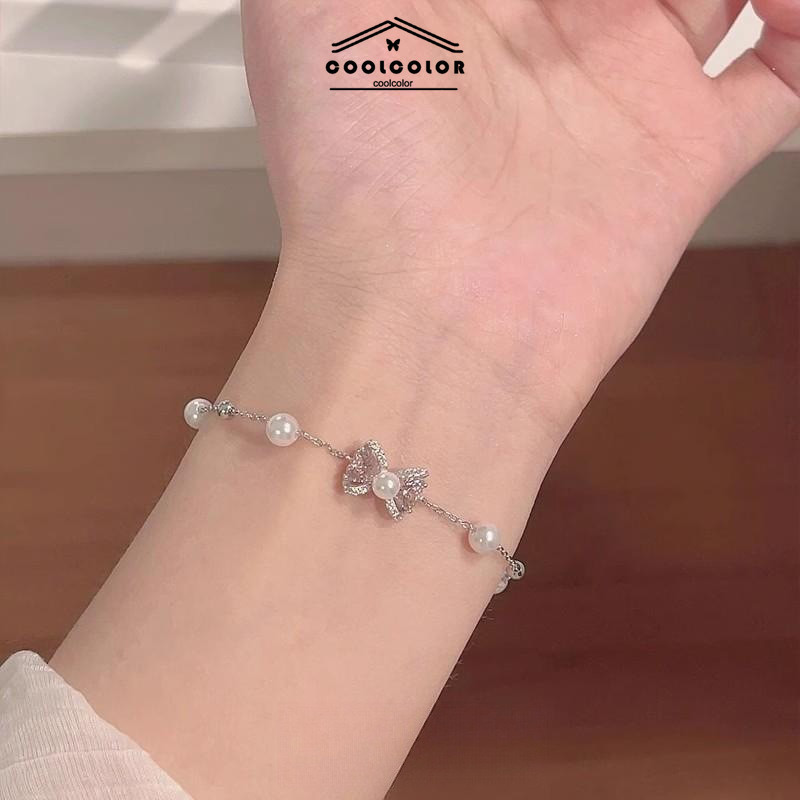 ในไทย สร้อยข้อมือโบว์ไข่มุกจี้ลูกปัดแฟชั่นเกาหลีหรูหราเสน่ห์กําไลข้อมือผู้หญิงสําหรับผู้หญิงเหมาะกับของขวัญวันเกิด