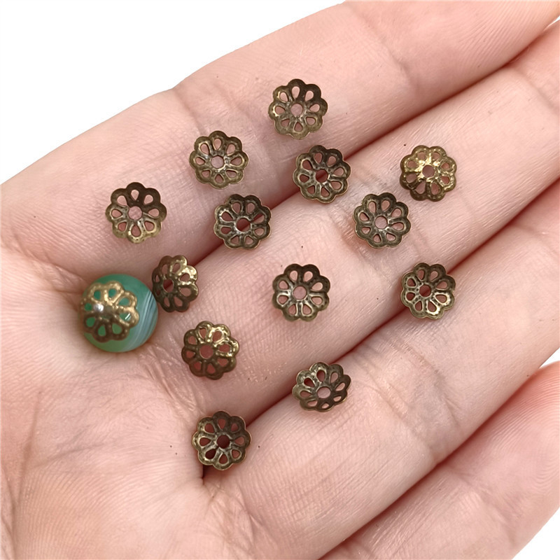 300 ชิ้น 6 มิลลิเมตรตัวเชื่อมต่อโลหะลูกปัด DIY Hollow ดอกไม้สําหรับเครื่องประดับทําผลการค้นหา Receptacle ต่างหูสร้อยข้อมือจี้ขายส่งสิ่งที่แนบมา