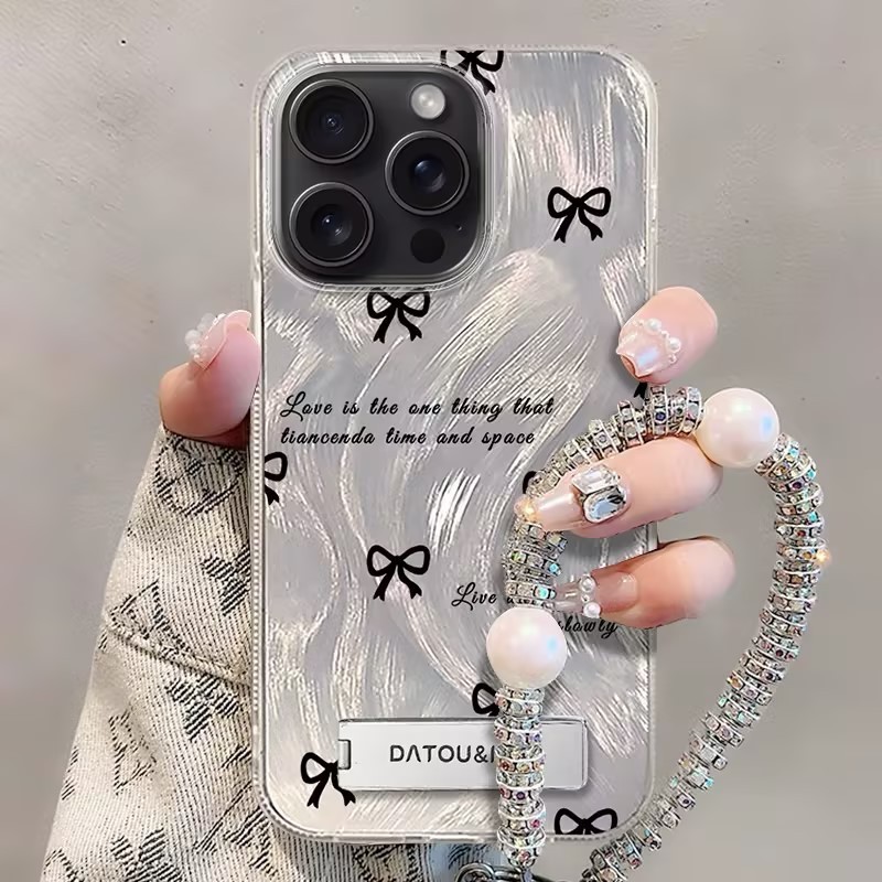 เคสไอโฟน โบว์ กากเพชร  ins สวย แฟชั่นเอกลักษณ์ สำหรับiPhone11promax 15plus 16 14 13 12mini XR/XSMax 7 8 SE2020 กันกระแทก