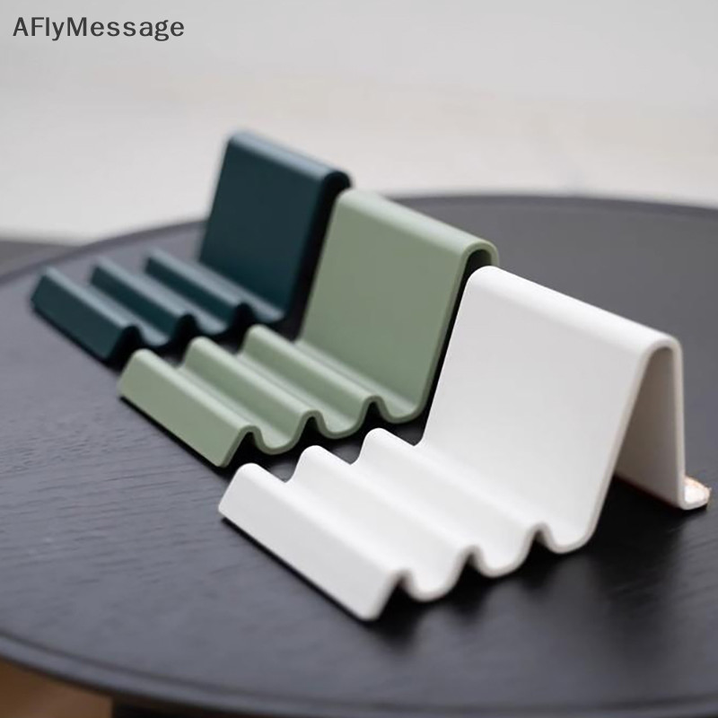 Afl Wave Shaped Phone Holder Desktop Holder สามารถใช้สําหรับแท็บเล็ต E-books ปรับมุมสําหรับดูละครทีวีและการเรียนรู้ TH