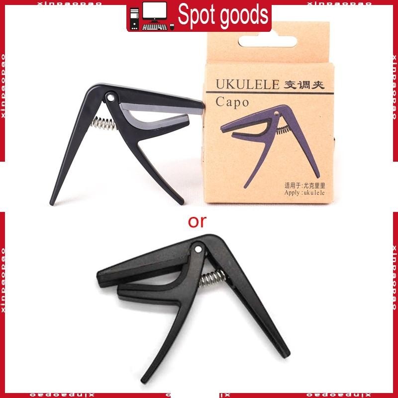 Xi Ukulele Capo 4 Strings กีตาร์มืออาชีพ Capos เปลี่ยนด่วนมือเดียว