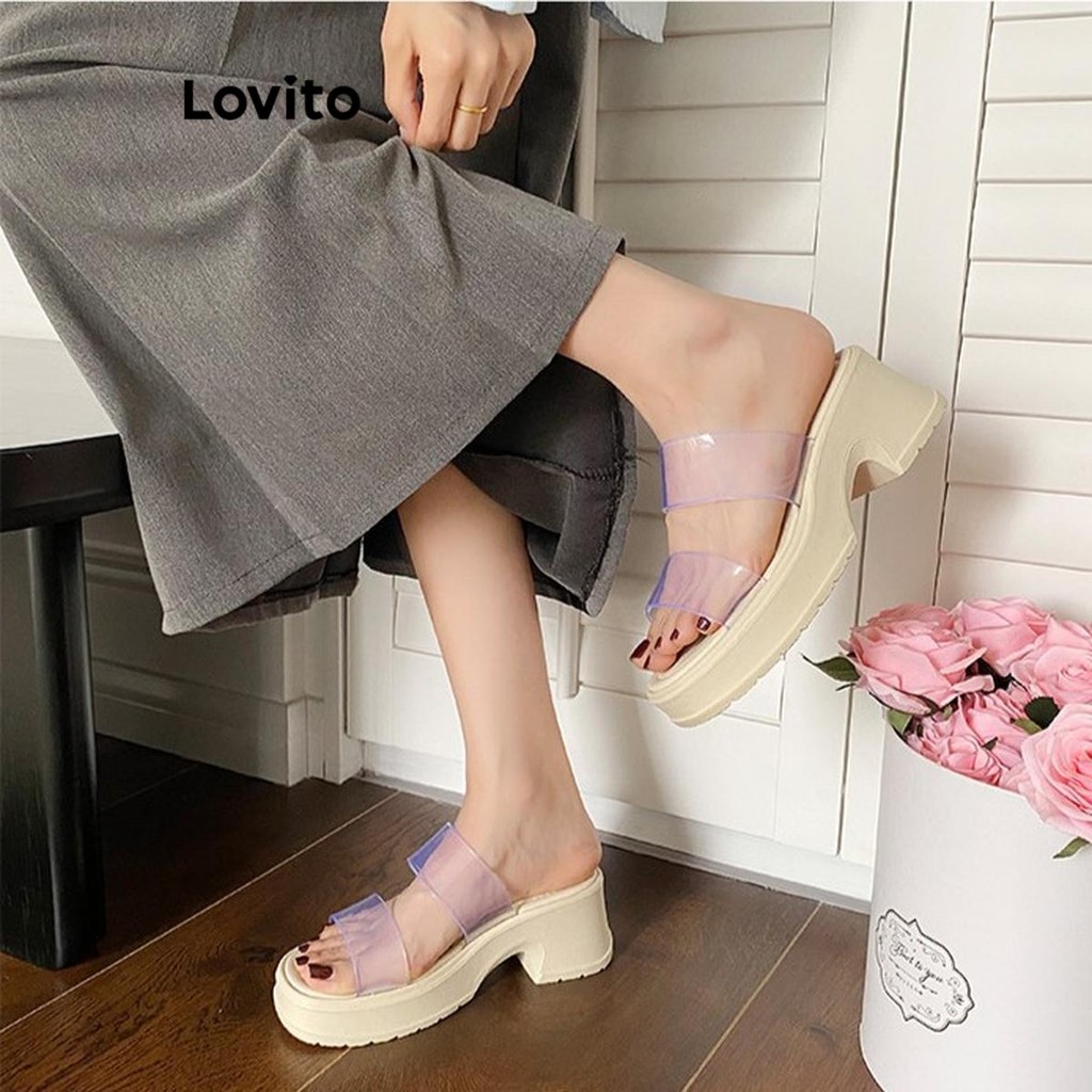 Lovito ลําลองธรรมดาอเนกประสงค์โปร่งใสพื้นหนาเพิ่มความสูงป้องกันการลื่นสวมใส่ด้านนอกรองเท้าแตะแบนสําหรับผู้หญิง  LFA62260
