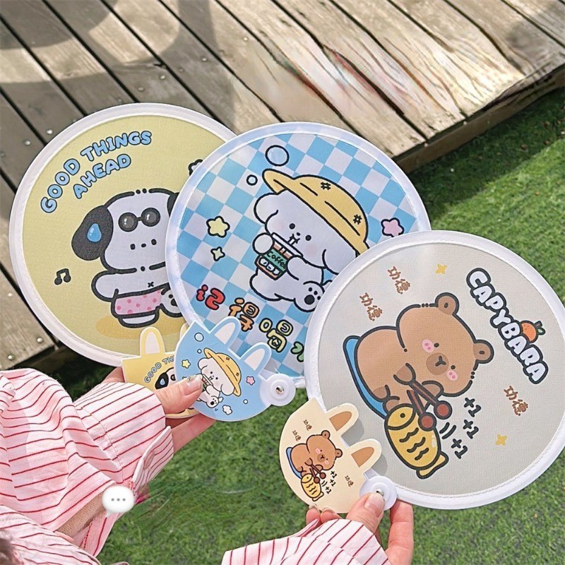 น ่ ารักพับ Capybara Group พัดลมการ ์ ตูน Sanrio Cinnamoroll แบบพกพาพับ Mini Storage นักเรียนมือถือพัดลม