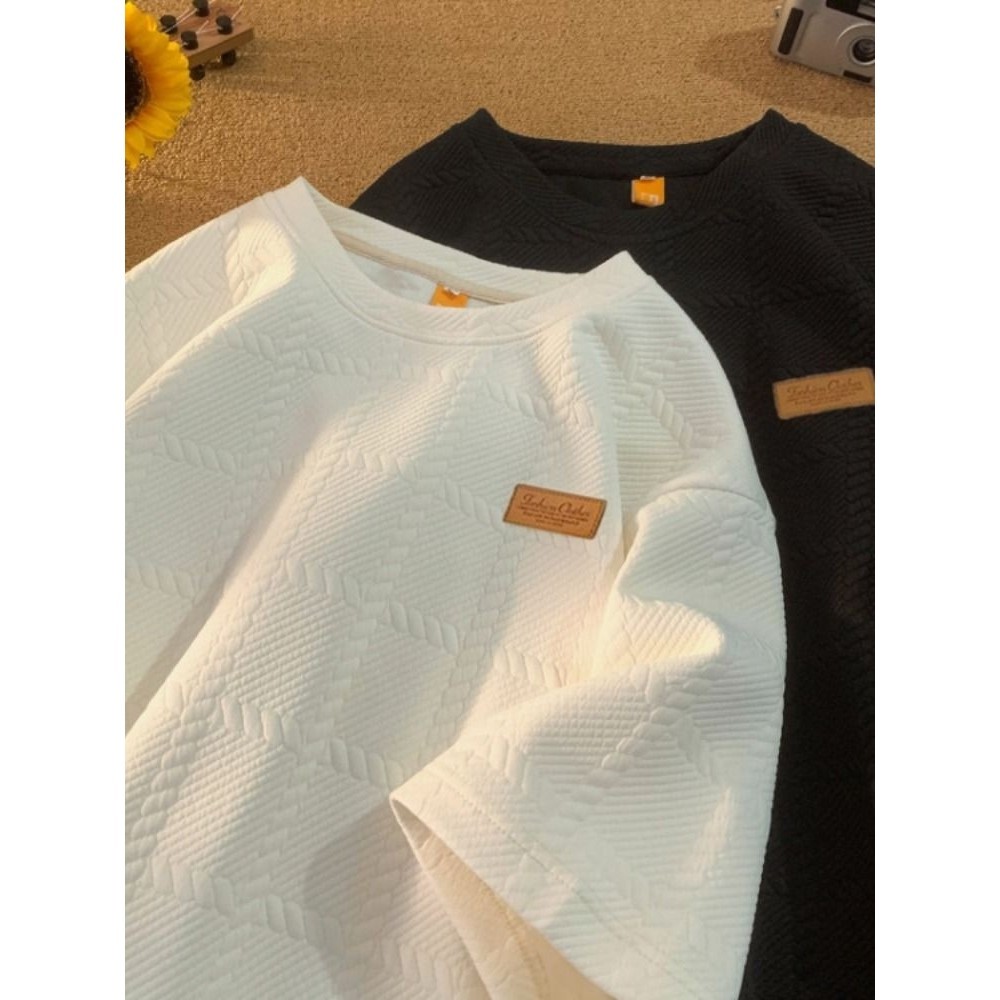 Design Sense Niche Texture Jacquard ครึ่งเสื้อยืดผู้ชายฤดูร้อน 2024 All-Matchอินเทรนด์สามQuart