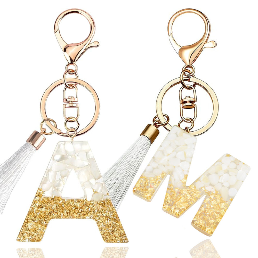 Bling Bling Yelloy สีทองฟอยล์ที่เต็มไปด้วยเรซิ่น Key Chain Fasion สีขาวพู่พวงกุญแจสําหรับผู้หญิงสาวกระเป๋าเป้สะพายหลังเครื่องประดับรถของขวัญรับปริญญา