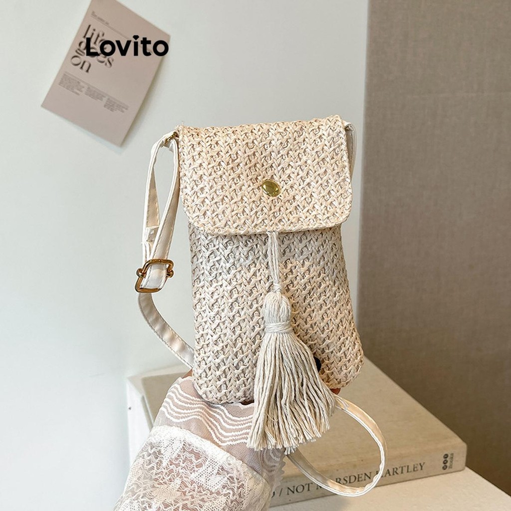 Lovito กระเป๋าโทรศัพท์มือถือวันหยุดธรรมดาแบบลําลองพร้อมกระเป๋าเสน่ห์พู่ฟางสําหรับผู้หญิง  LFA65035