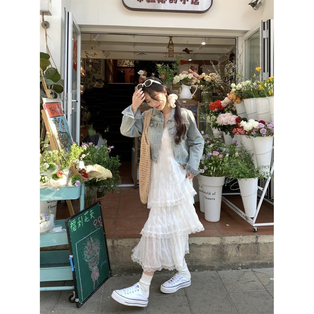 LYQYL คลังสินค ้ าพร ้ อมหวานลดอายุสีขาวชุดสลิงฝรั ่ งเศสผู ้ หญิงฤดูร ้ อนสไตล ์ วันหยุดขนาดเล ็ กหลวมเค ้ กกระโปรงยาว