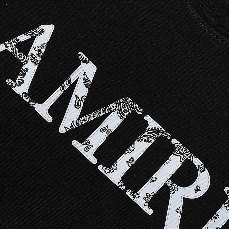 โลโก้คลาสสิกเม็ดมะม่วงหิมพานต์ดอกไม้พิมพ์คุณภาพสูงผ้าฝ้ายแท้เส้นด้ายคู่เสื้อยืดแขนสั้นลําลอง