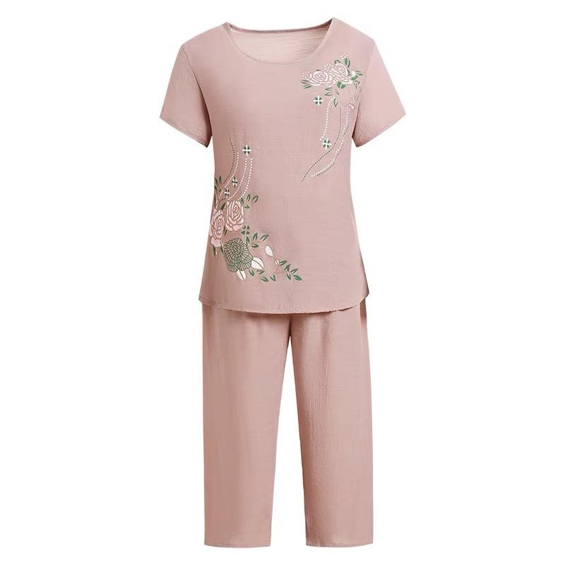 เสื้อยืดคอกลมแขนสั้นลายดอกไม้ผู้หญิงชุดลําลอง + กางเกงขายาวสองชิ้นขากว้างตรงแฟชั่นใหม่ชุดหลวมทุกการแข่งขัน - รูปที่ 4