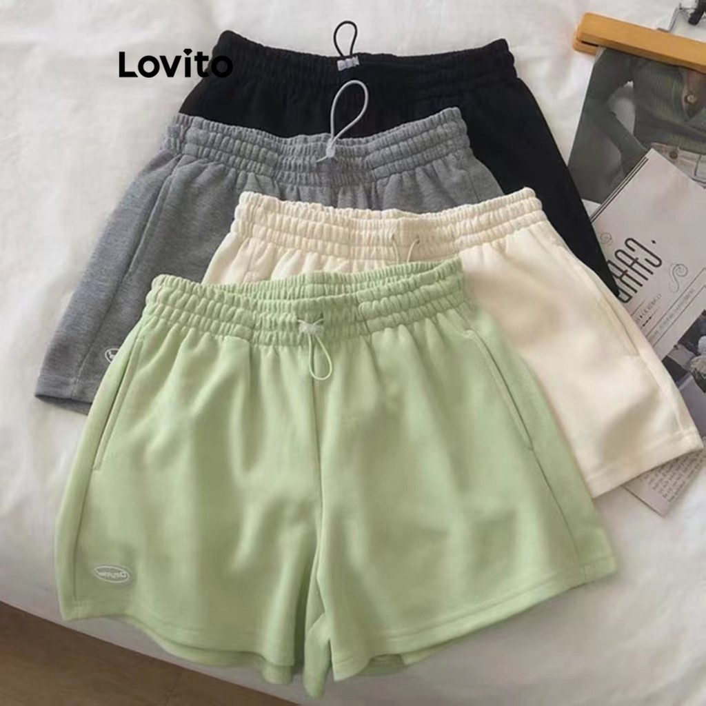 Lovito กางเกงขาสั้นผู้หญิง กระดุมหน้ มีกระเป๋า สีพื้น สไตล์ลำลอง LNA50159