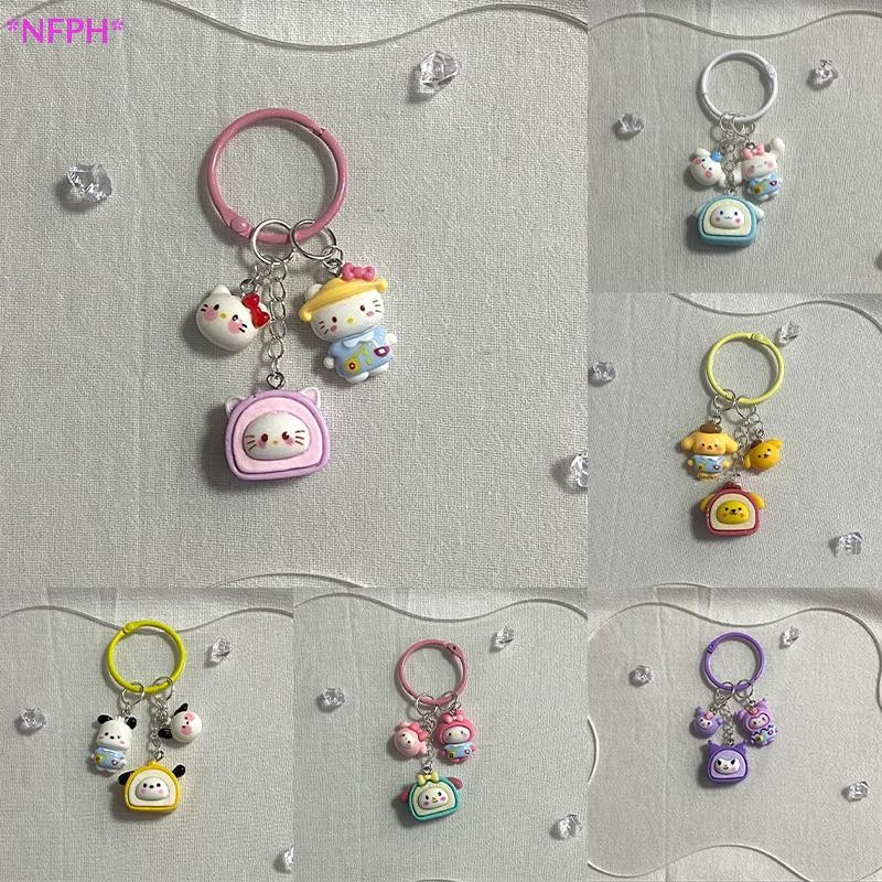 Nfph>sanrio Anime Hello Kitty พวงกุญแจการ์ตูน Kawaii อบเชยสุนัข Kuromi Melody กระเป๋าเป้สะพายหลังจี้อุปกรณ์เสริมพวงกุญแจเด็กน่ารักของขวัญใหม่