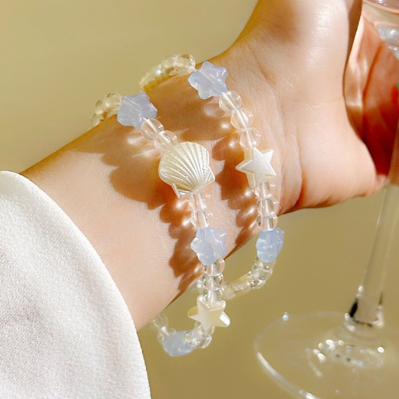 สร้อยข้อมือลูกปัดดาวห้าแฉกเปลือกหอยสีขาวสีน้ําเงินผู้หญิง - รูปที่ 2