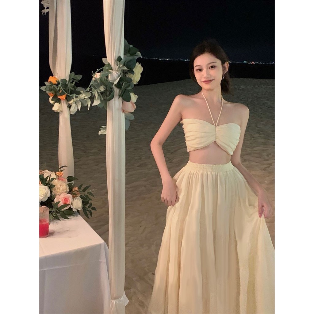 กระโปรงยาว สไตล์สั้นวันหยุดสไตล์ใหม่ ชม. เปลี่ยนแปลง กลับเอวสูง ผอมลง ดูฤดูร้อนด้านบนผู้หญิงสองชิ้นชุดกระโปรงท่อบนเซ็กซี่หน้าอก ซีเคโม